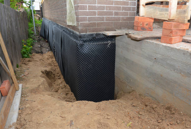 SJ Waterproofing Pros technician performing targeted Emergency Waterproofing assessment in Warrington, PA